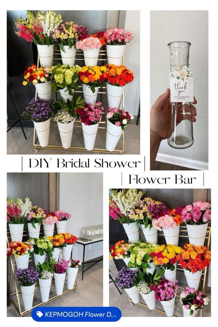 Tiered flower bar display with colorful flowers in white buckets